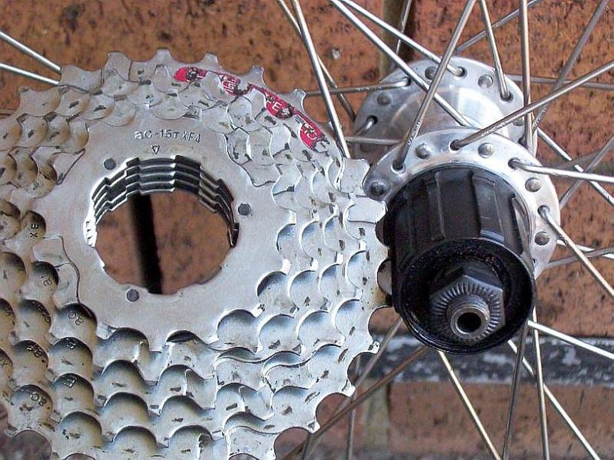 Cassette sprockets separated from a splined freehub that remains attached to the wheel